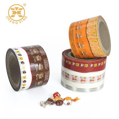 Los dulces de los chocolates de los caramelos ACARICIAN la película de rollo de empaquetado Twistable